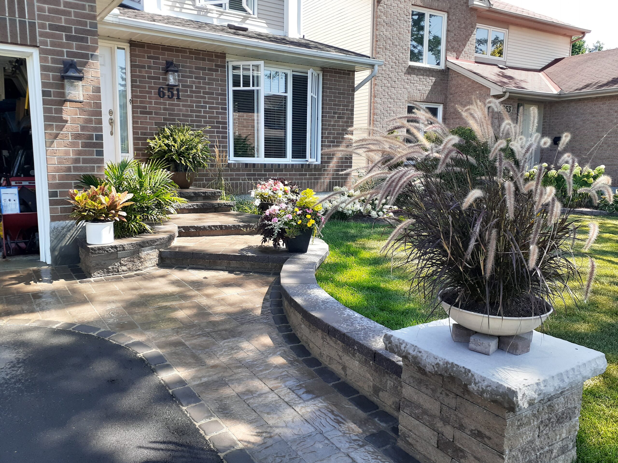 Interlock patio and landscaped front yard